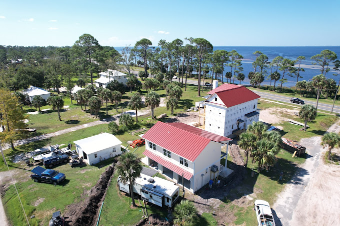 Standing seam metal roofing installation showcasing quality craftsmanship in Bay County
